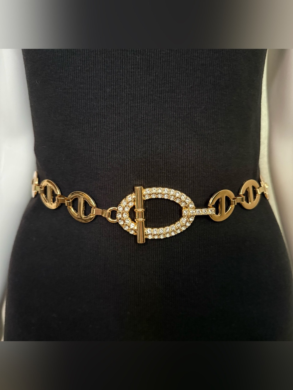 Gold tone metal chain belt with rhinestone details